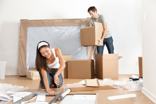 Unpacking household belongings in a modern Shoreditch flat