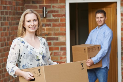 Moving van and packed boxes prepared for collection