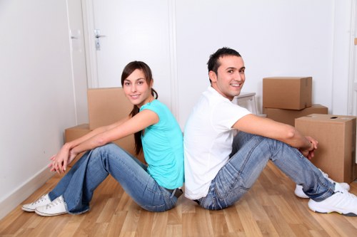 Removal team handling items in a Shoreditch apartment building