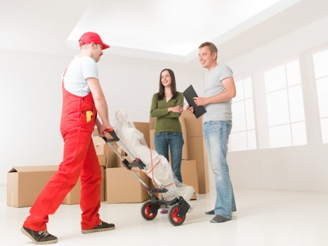 Local movers loading boxes and furniture for Shoreditch delivery