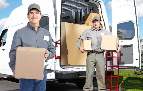 Packing and loading items into a van for a Shoreditch move